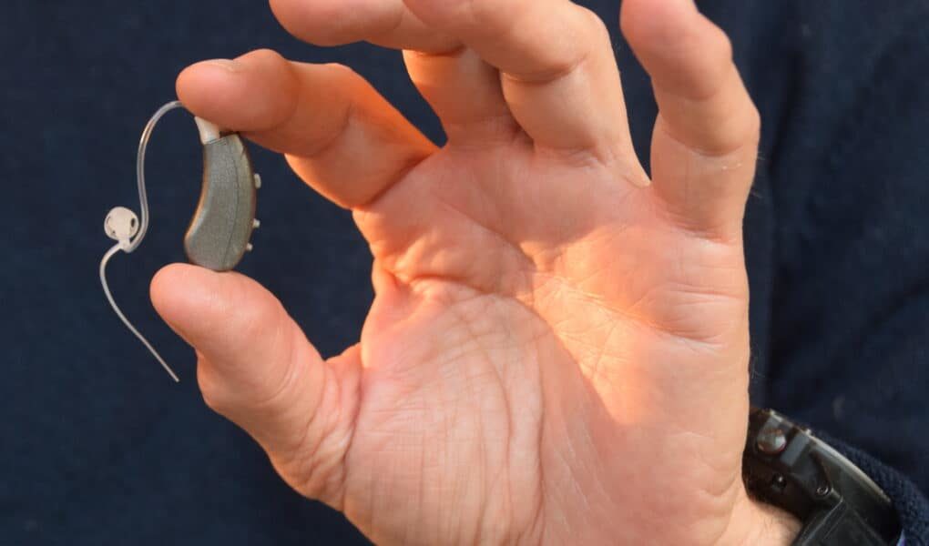 Hearing Aid in Hand